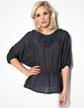B.Young Tape Tunic