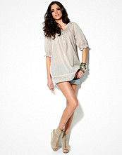 B.Young Tumo Tunic