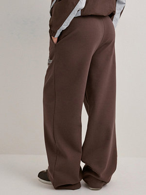 Nike byxor W Nk Phnx Flc Hr Pant Wd Gls - Brun