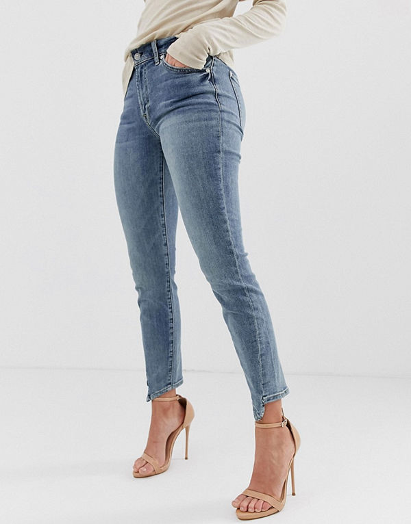 7 For All Mankind Ankellånga skinny jeans med asymmetriskt skuren fåll Bair authentic fort