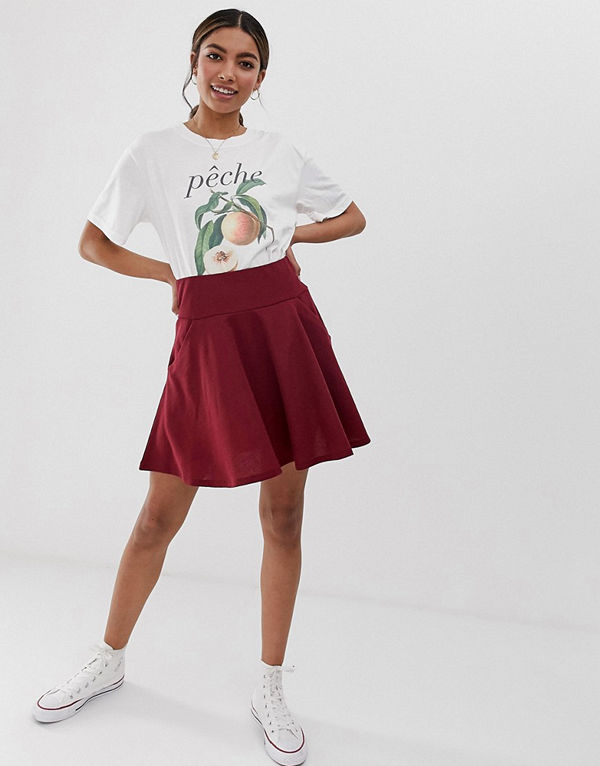 ASOS DESIGN Texturerad skaterkjol i minimodell med fickor Plommonlila