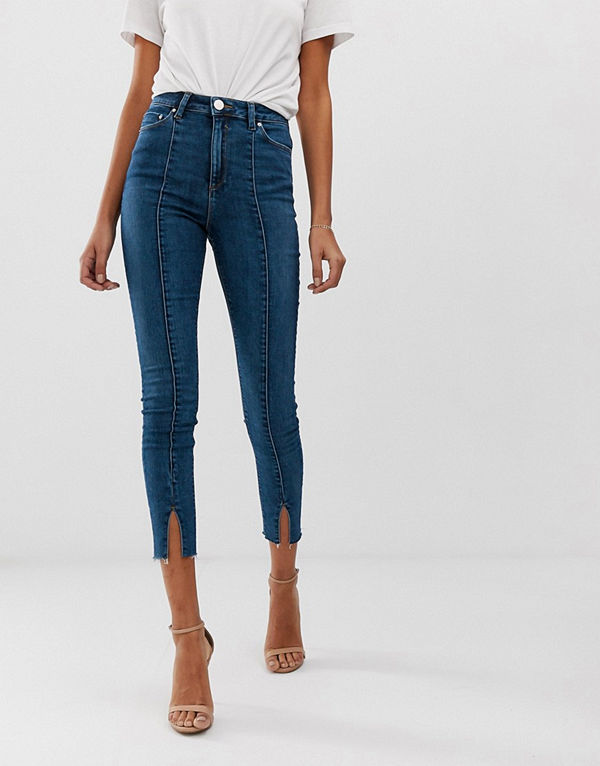 ASOS DESIGN Ridley Mellanblå skinny jeans Med sömmar framtill och slits nertill Mellanblå