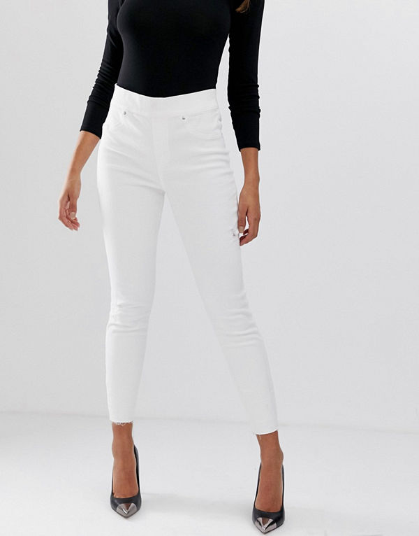 Spanx Shape and Lift Skinny jeans med slitna detaljer