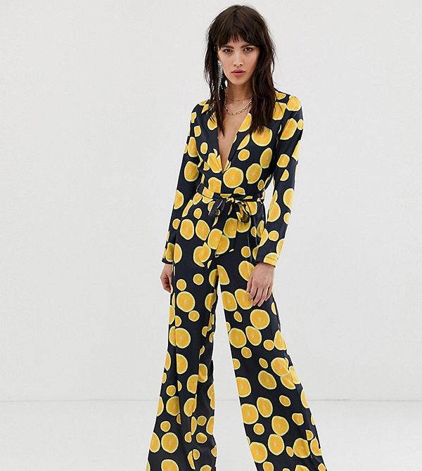 Dusty Daze Apelsinmönstrad jumpsuit med vida ben