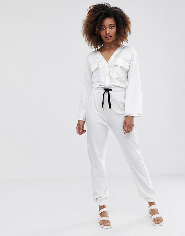 ASOS DESIGN Jumpsuit i jersey med fickor framtill och kontrastsöm
