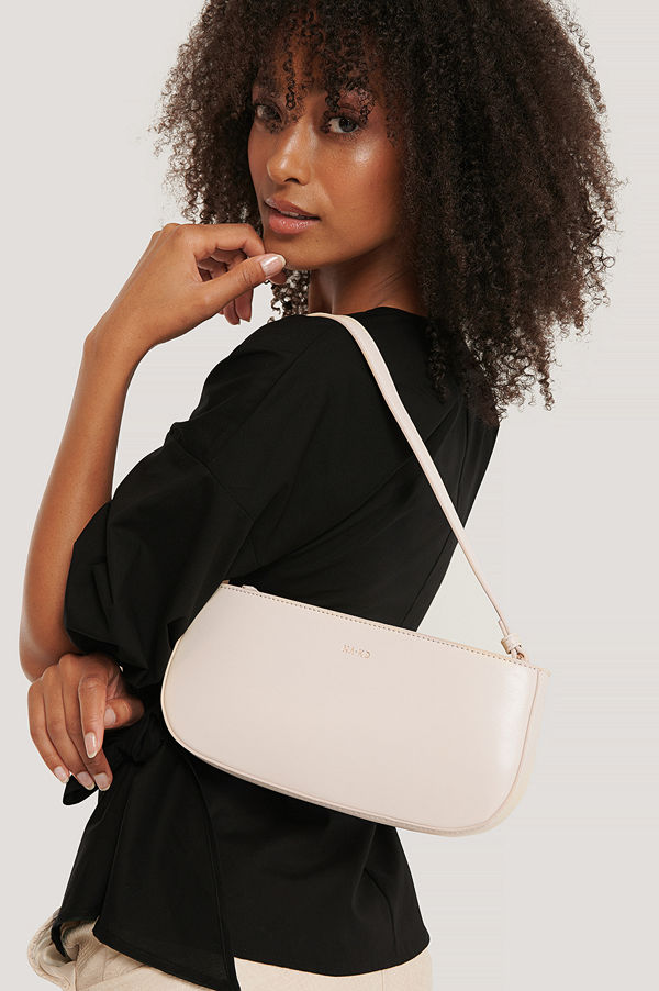 NA-KD Accessories vit axelväska Baguette Bag beige