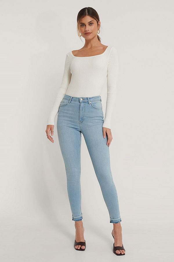 NA-KD Reborn Ekologiska skinny jeans med hög midja och öppen fåll blå
