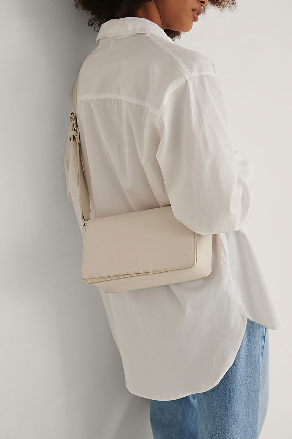 NA-KD Accessories vit axelväska Crossbodyväska beige