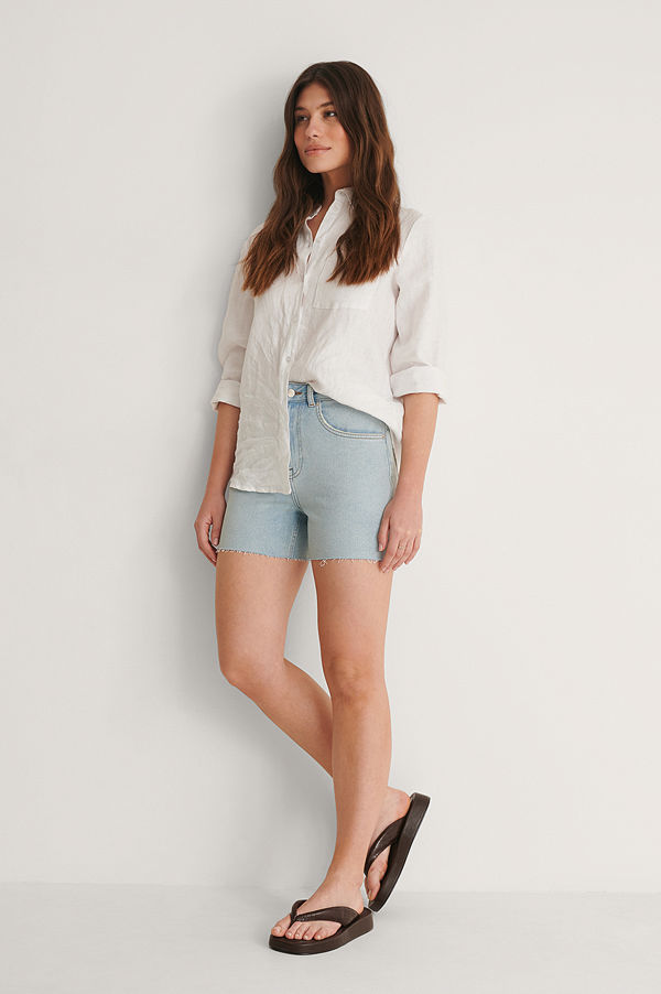 NA-KD Denimshorts I Ekologisk Bomull Med Rå Kant blå