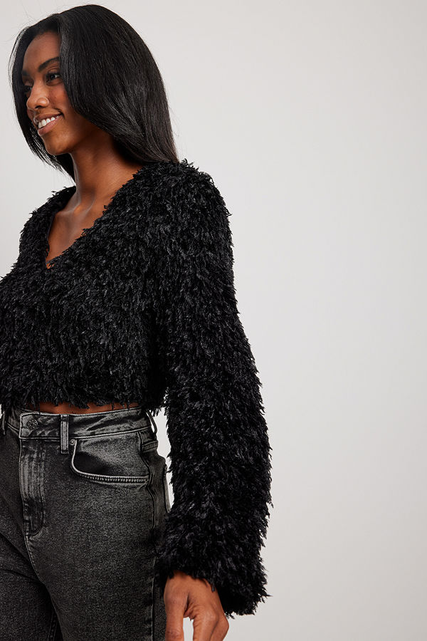 NA-KD Party Fluffig blus med V-hals svart