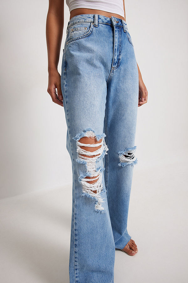 NA-KD Trend Jeans med vida ben och slitna detaljer blå
