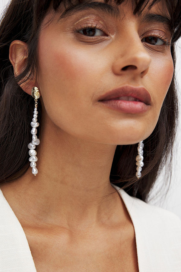 NA-KD smycke Örhängen med dinglande pärla guld