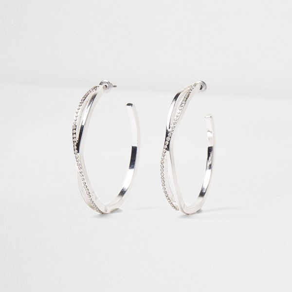 River Island örhängen Silver tone diamante pave twist hoop earrings