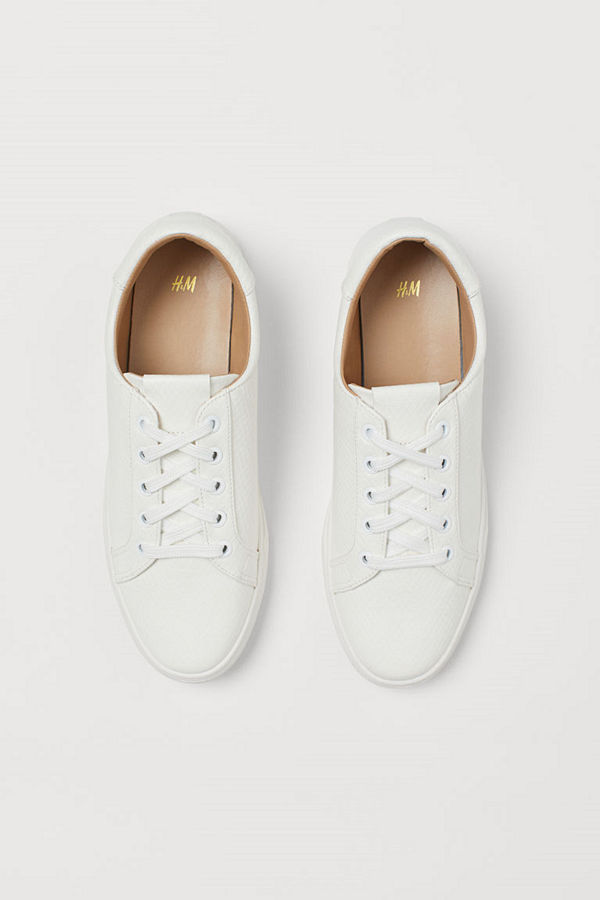 H&M Ormskinnsmönstrade sneakers vit