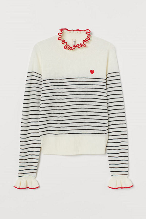 H&M Stickad tröja med volang vit