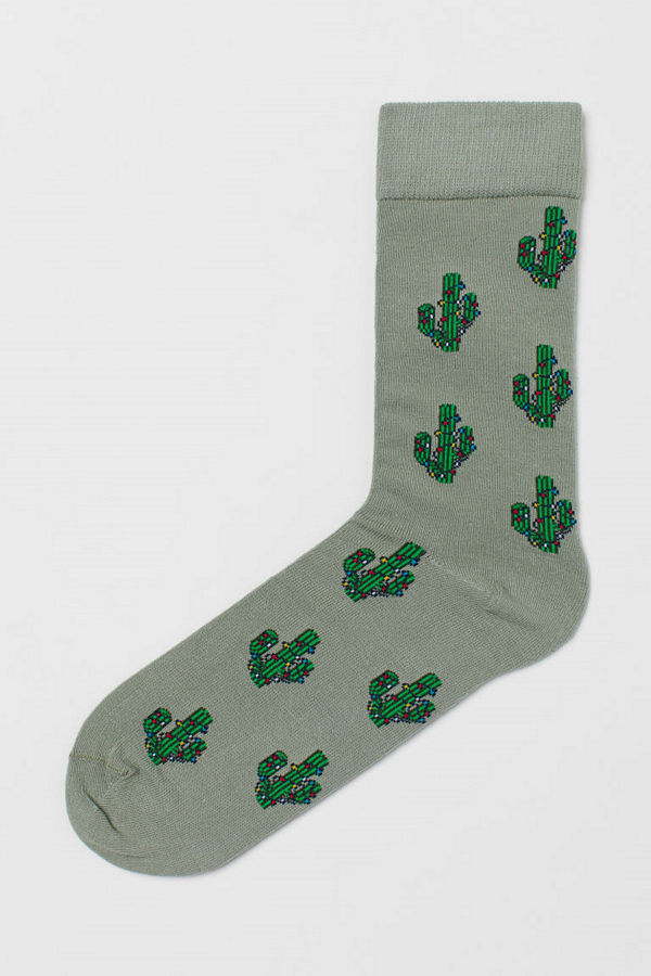 H&M Jacquardstickade strumpor grön
