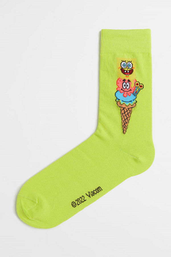 H&M Strumpor med motiv gul